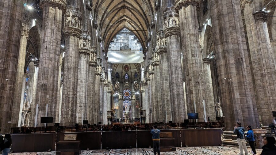 Milan Destination Guide: The Model of Fashion, Food, and Gothic Grandeur 4 Majestic cathedral interior with columns.